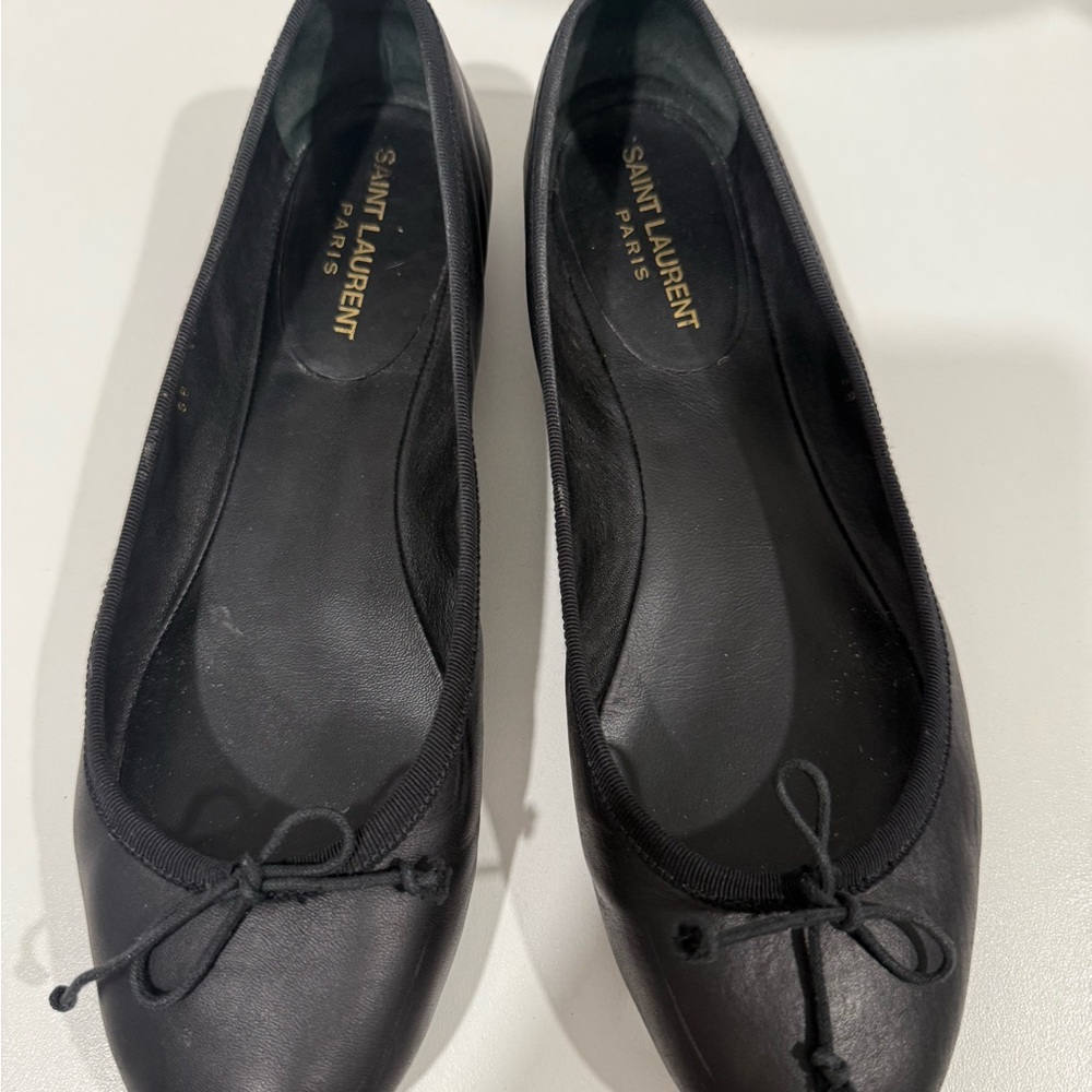 Authentic Saint Laurent, Paris, black ballet shoes.